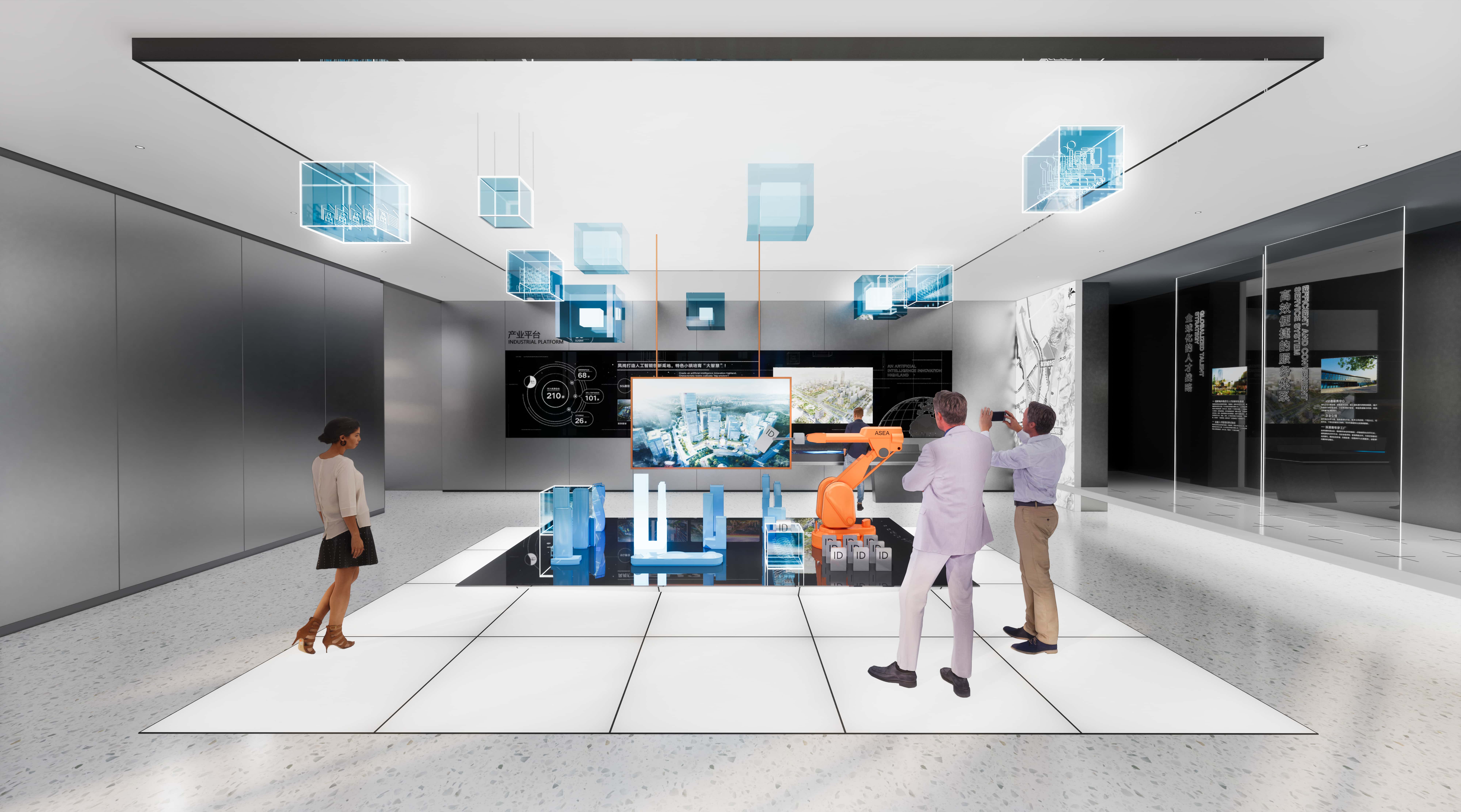 The central location of this area adopts the relevant enterprise product elements of artificial intelligence special small towns，and the spatial function planning of the small towns is pre recorded with ID cards. When the iPad central control operates to view a certain information ID card，the robotic arm will place the ID card in the slot next to it，and the middle screen will start playing the corresponding video information.